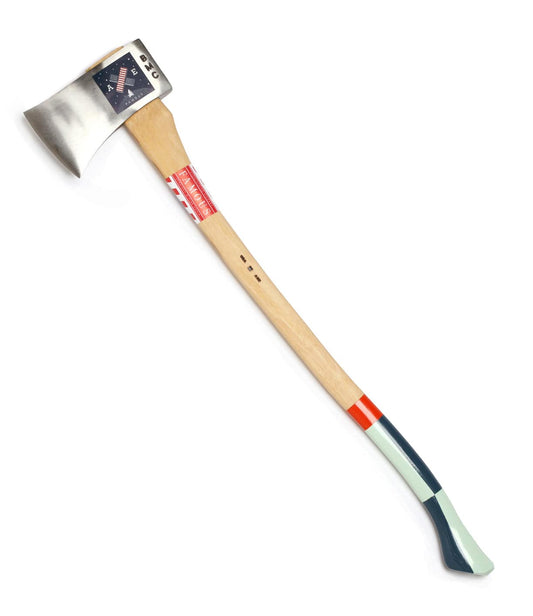 A single-headed ax with a wooden handle and a silver blade. The handle features color accents in red, white, black, and green. A label is attached to the handle near the blade.