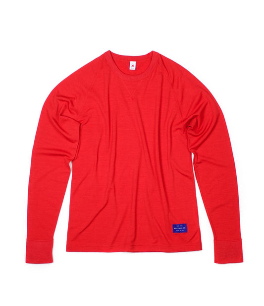 A red long-sleeve t-shirt laid flat on a white background.