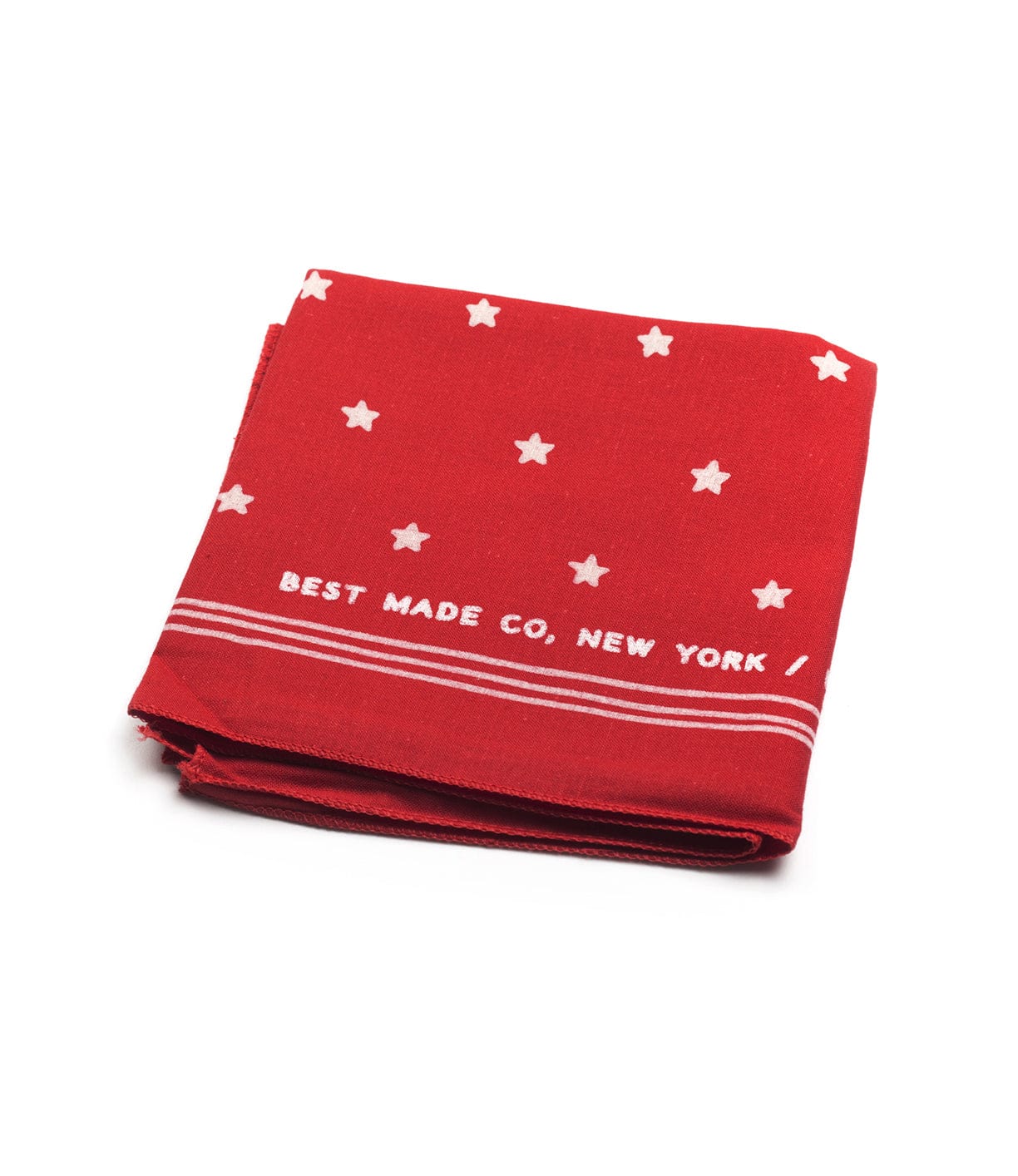 A folded red cloth featuring white stars and the text BEST MADE CO, NEW YORK near the edge.