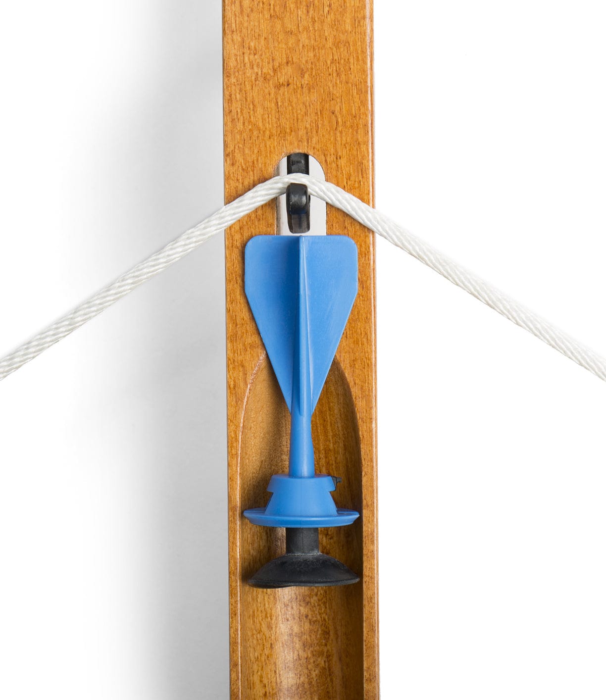 Close-up of a wooden archery bow with a white bowstring connected to a blue plastic arrow rest, set against a white background.