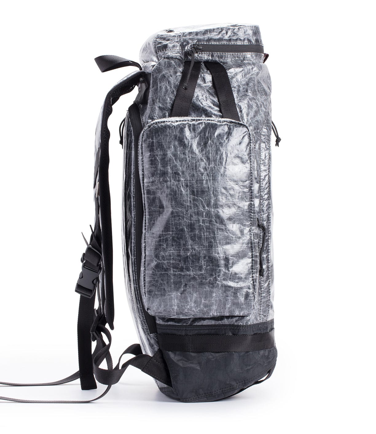 Side view of a grey, cylindrical backpack with black straps and multiple compartments.