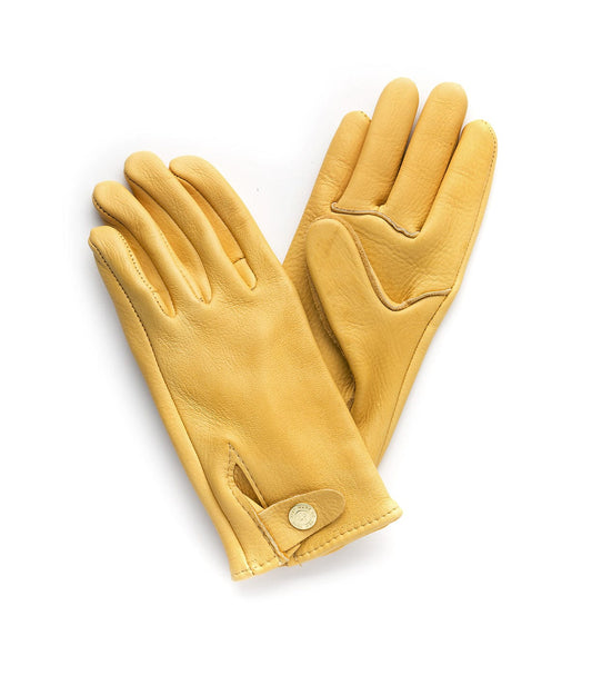 A pair of yellow leather gloves with button snap closures, laid flat against a white background.