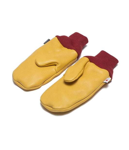 A pair of yellow mittens with red cuffs, laid flat on a white background.