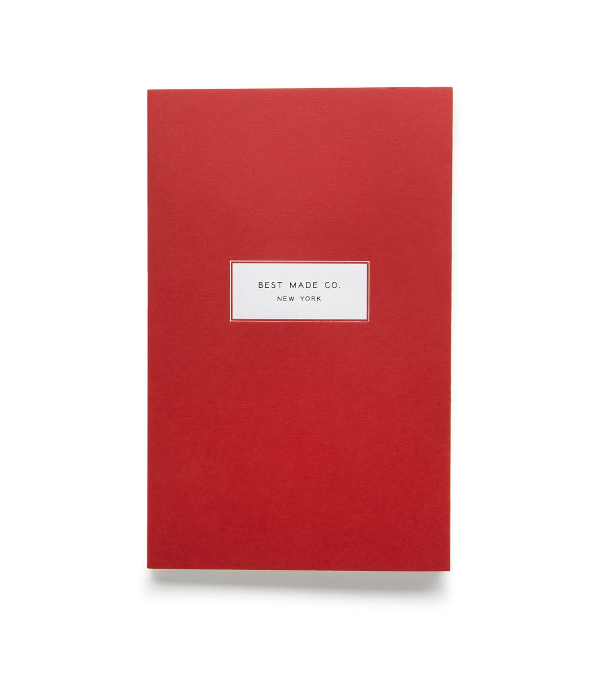 A red notebook with a white label in the center, printed with Best Made Co. New York.