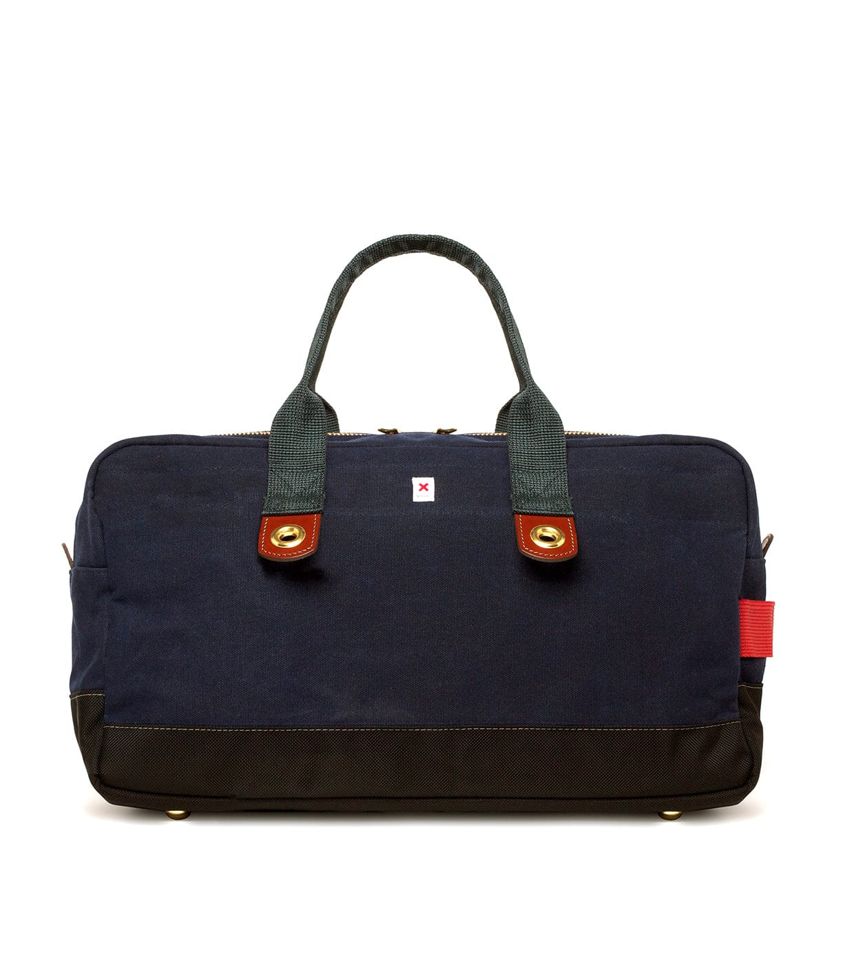 A navy blue and black duffel bag with green handles and a red tag, featuring gold hardware and a small white logo in the center.