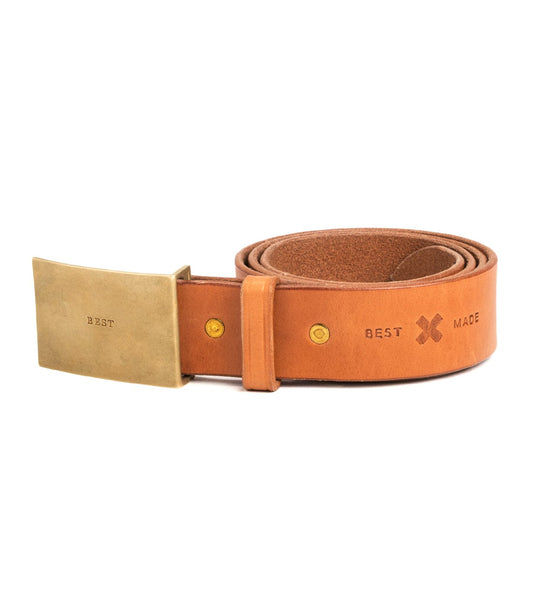 A coiled brown leather belt with a rectangular brass buckle. The belt has BEST and BEST MADE stamped in black on the leather.