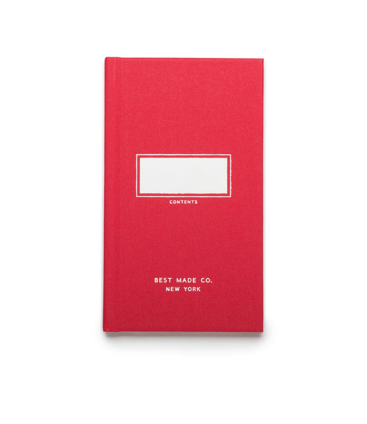 A red hardcover book with a blank label area and the text CONTENTS in the center, and BEST MADE CO. NEW YORK at the bottom.