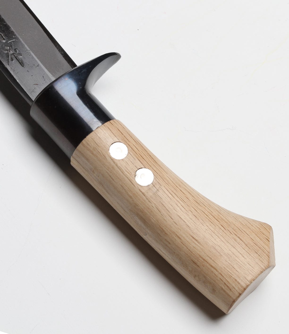 A kitchen knife with a wooden handle and metal blade is shown on a white background.