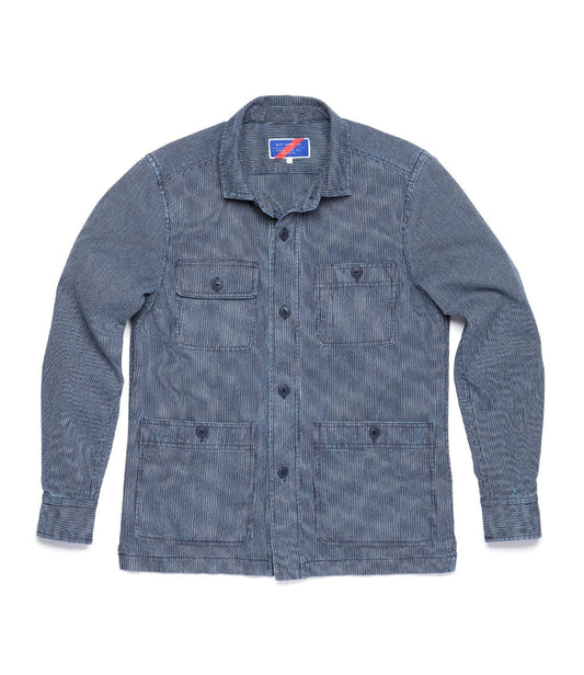 Front view of a blue button-up denim jacket with four pockets and a collar.