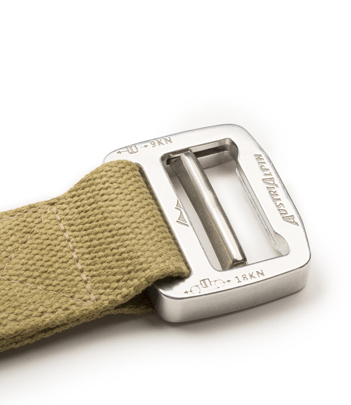 Close-up image of a beige fabric strap with a silver metal buckle labeled Ausralpin and strength ratings of 9 kN and 8 kN.