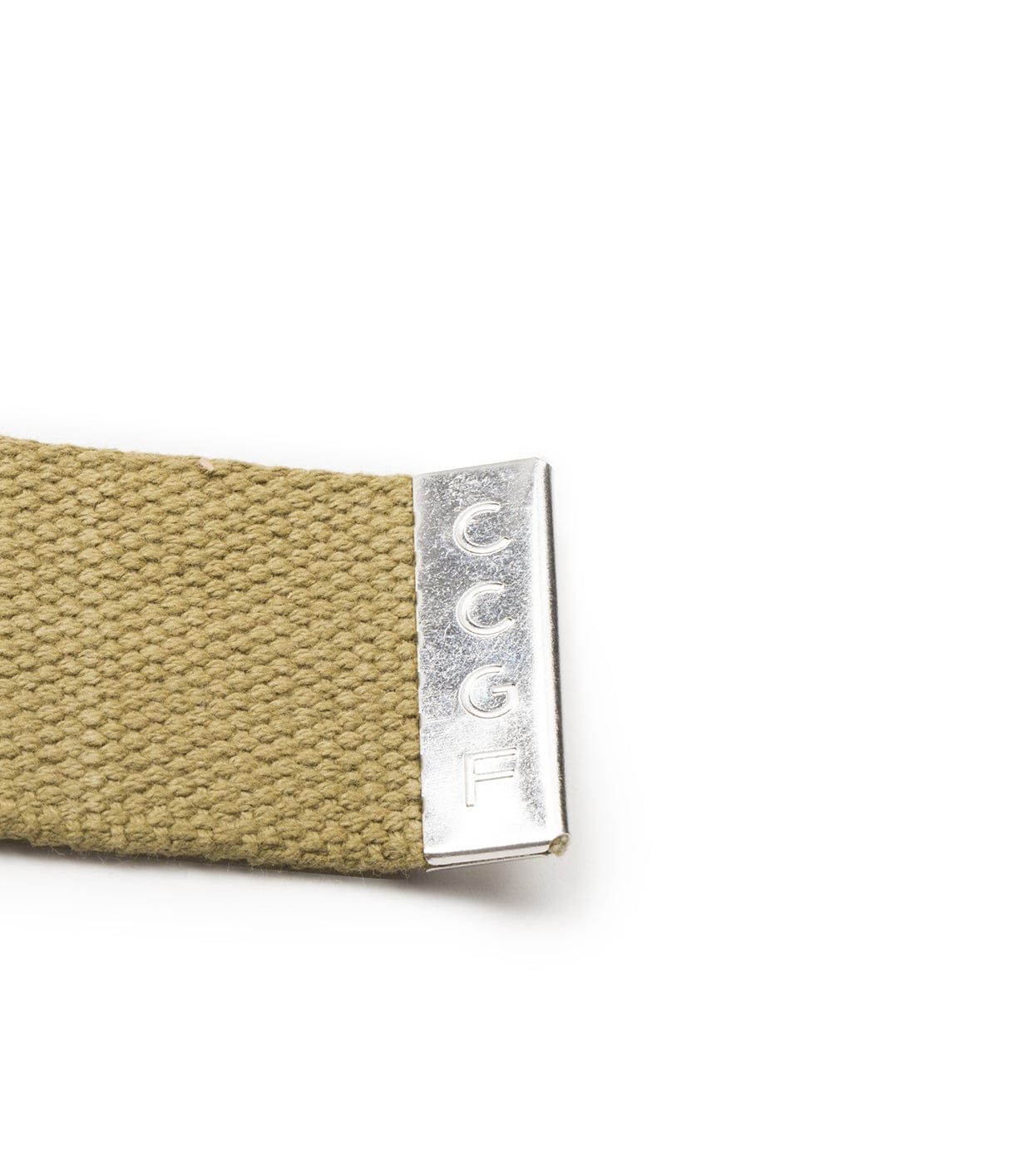 Close-up of a beige textured fabric belt with a silver metal tip engraved with the letters ‚ÄúCCGF.‚Äù.