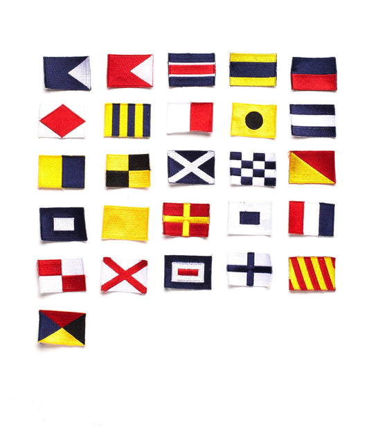 A grid of 26 different nautical signal flags displayed on a white background. Each flag has distinct colors and patterns.