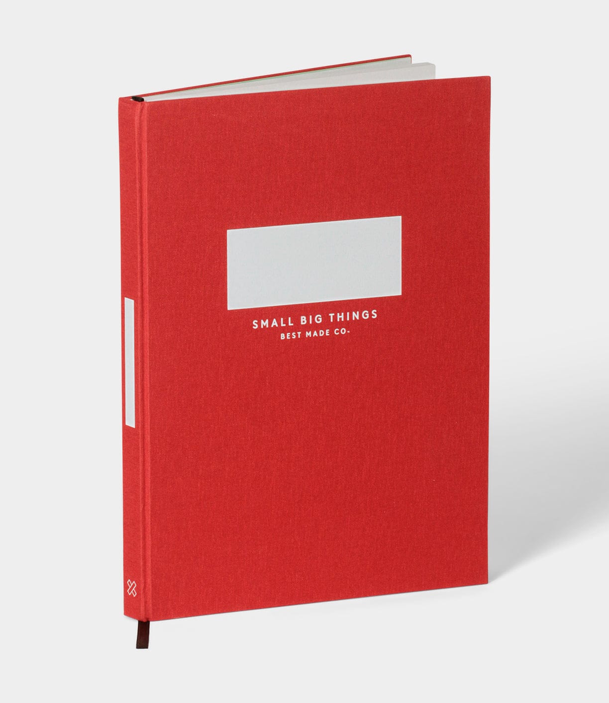 Red hardcover book titled Small Big Things by Best Made Co., with a plain white label on the cover.