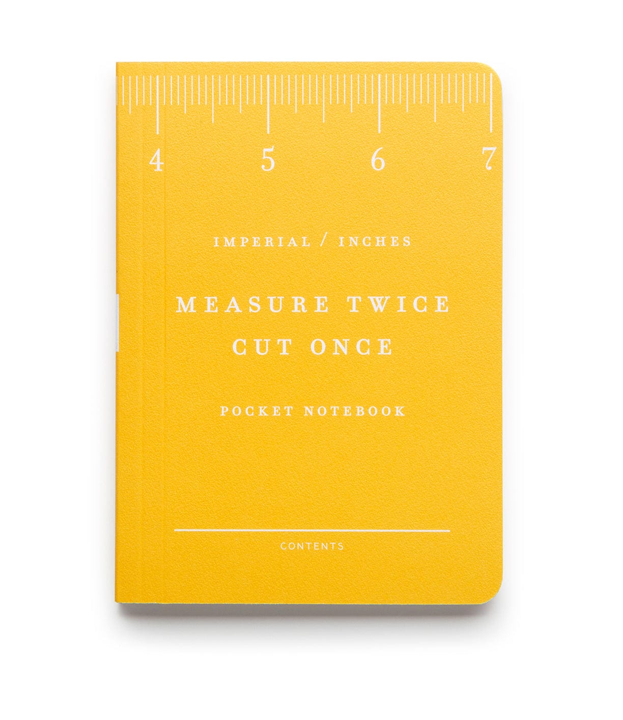 A yellow pocket notebook with a ruler design on top reads Measure Twice Cut Once and Imperial/Inches on the cover.