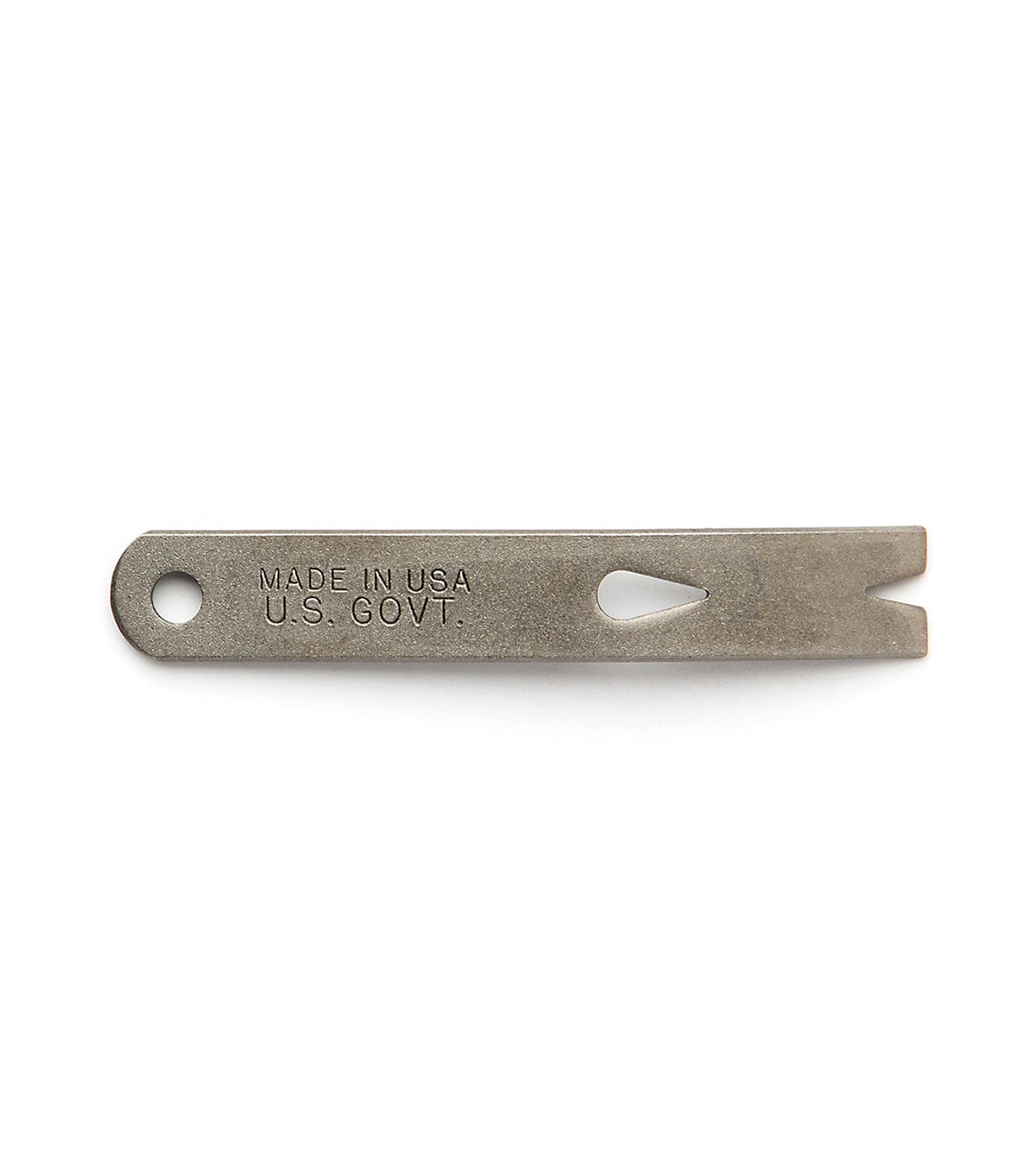 A small metal tool with a hole on one end and a split prong on the other, inscribed with MADE IN USA and U.S. GOVT.