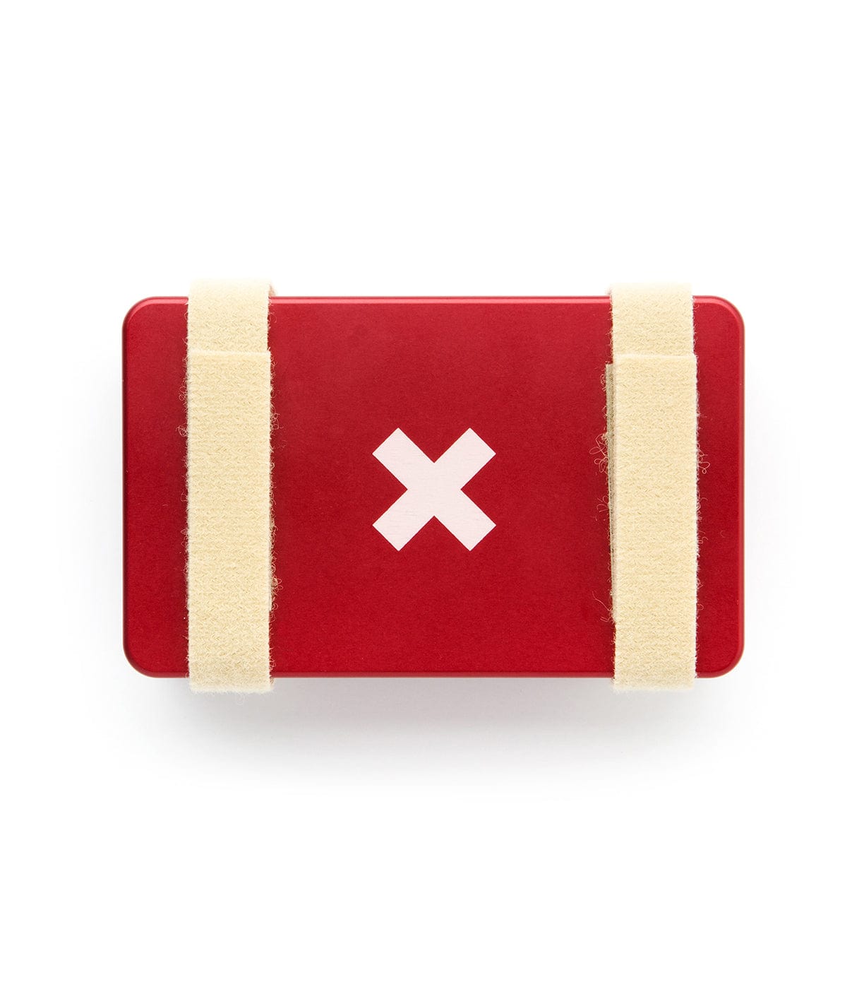 A red first aid kit with a white cross on the front, secured by two beige straps.