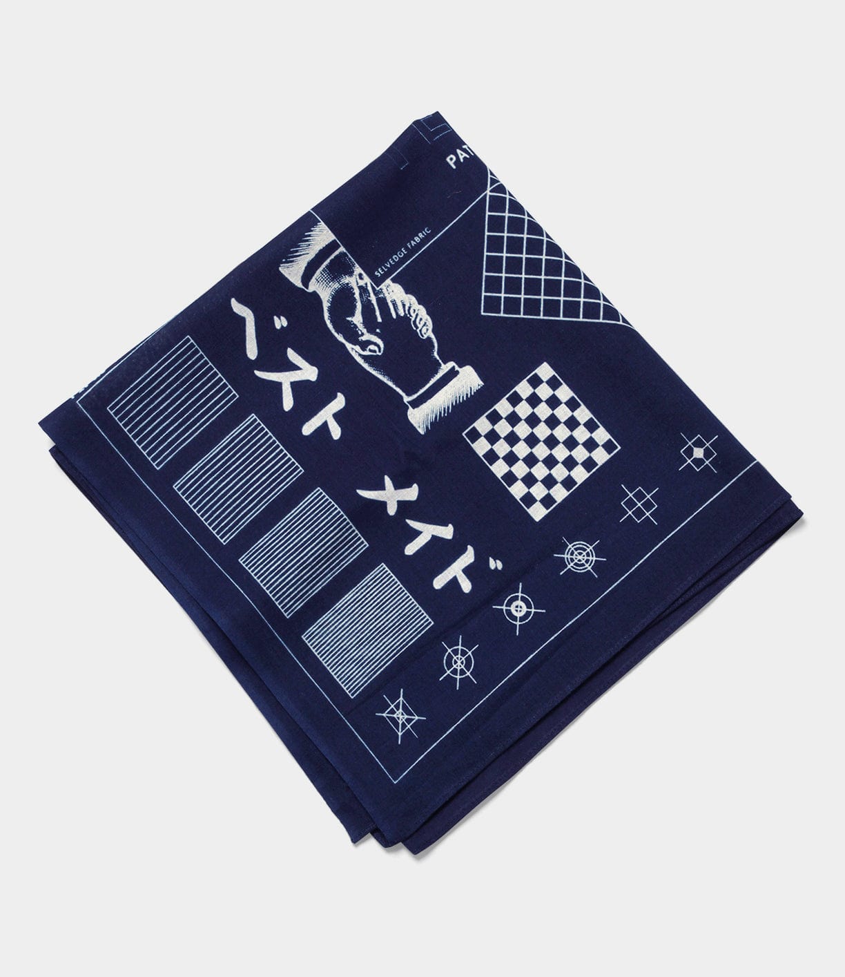 A folded navy blue bandana featuring white illustrations of various geometric patterns, a handshake, and Japanese characters.