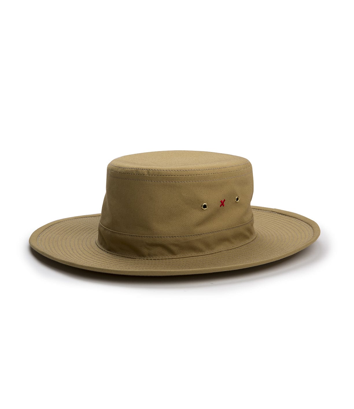 A tan, wide-brimmed hat with two small ventilation holes on the side and a red 'X' stitched near the crown.