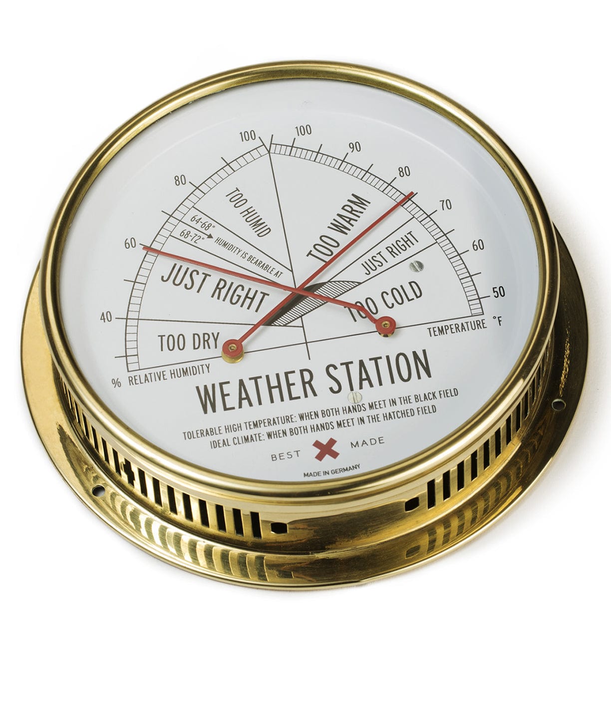 A brass analog weather station showing comfortable and uncomfortable temperature ranges with labels such as Too Warm and Too Cold. The needle points to Just Right.