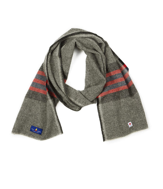 A gray scarf with red and black stripes near the ends.